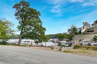 Experience the best of lake living in this extraordinary Lake on Lake Quivira Country Club in Kansas - for sale on GolfHomes.com, golf home, golf lot