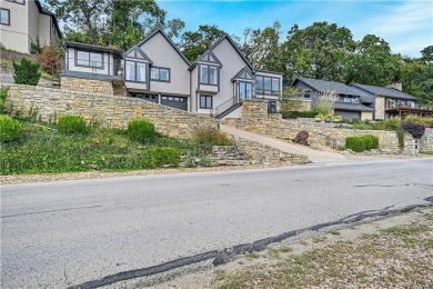 Experience the best of lake living in this extraordinary Lake on Lake Quivira Country Club in Kansas - for sale on GolfHomes.com, golf home, golf lot