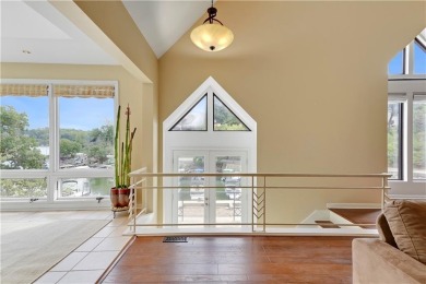 Experience the best of lake living in this extraordinary Lake on Lake Quivira Country Club in Kansas - for sale on GolfHomes.com, golf home, golf lot
