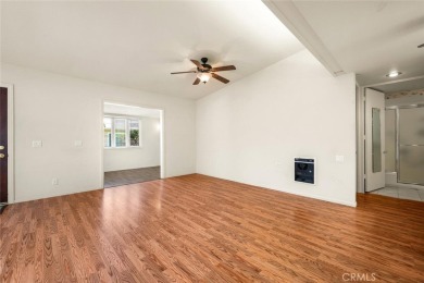 Mutual 12-68E ~ This beautifully expanded 2 bedroom 1 bath home on Leisure World Seal Beach Golf Course in California - for sale on GolfHomes.com, golf home, golf lot