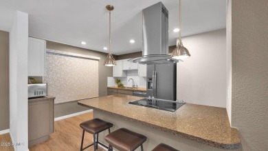 This move-in ready gem is immaculate from top to bottom and on Union Hills Country Club in Arizona - for sale on GolfHomes.com, golf home, golf lot