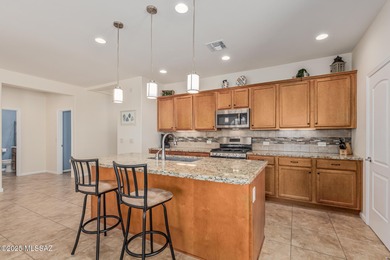 Discover easy living in this charming, well-cared-for Villa--an on Quail Creek Country Club  in Arizona - for sale on GolfHomes.com, golf home, golf lot