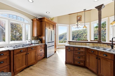 This stunning mountain retreat combines timeless craftsman on Big Canoe Golf Club - Cherokee in Georgia - for sale on GolfHomes.com, golf home, golf lot