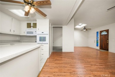 Mutual 12-68E ~ This beautifully expanded 2 bedroom 1 bath home on Leisure World Seal Beach Golf Course in California - for sale on GolfHomes.com, golf home, golf lot