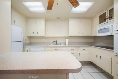 Mutual 12-68E ~ This beautifully expanded 2 bedroom 1 bath home on Leisure World Seal Beach Golf Course in California - for sale on GolfHomes.com, golf home, golf lot
