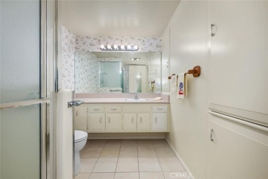 Mutual 12-68E ~ This beautifully expanded 2 bedroom 1 bath home on Leisure World Seal Beach Golf Course in California - for sale on GolfHomes.com, golf home, golf lot