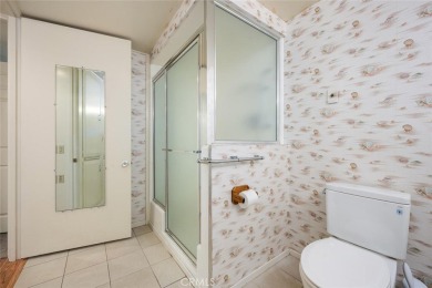 Mutual 12-68E ~ This beautifully expanded 2 bedroom 1 bath home on Leisure World Seal Beach Golf Course in California - for sale on GolfHomes.com, golf home, golf lot