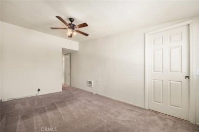 Mutual 12-68E ~ This beautifully expanded 2 bedroom 1 bath home on Leisure World Seal Beach Golf Course in California - for sale on GolfHomes.com, golf home, golf lot
