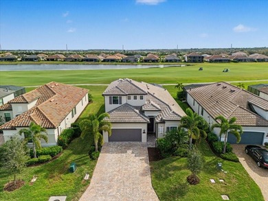 Golf, water, and sunrise views with true backyard privacy! Built on Lakewood National Golf Club in Florida - for sale on GolfHomes.com, golf home, golf lot