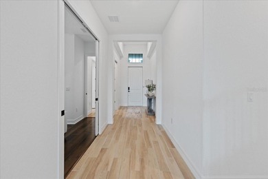 Golf, water, and sunrise views with true backyard privacy! Built on Lakewood National Golf Club in Florida - for sale on GolfHomes.com, golf home, golf lot