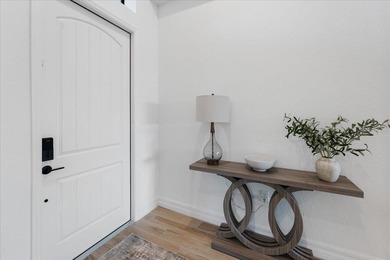 Golf, water, and sunrise views with true backyard privacy! Built on Lakewood National Golf Club in Florida - for sale on GolfHomes.com, golf home, golf lot