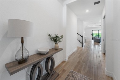 Golf, water, and sunrise views with true backyard privacy! Built on Lakewood National Golf Club in Florida - for sale on GolfHomes.com, golf home, golf lot