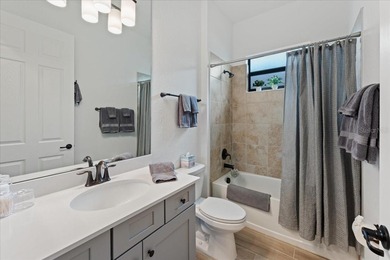 Golf, water, and sunrise views with true backyard privacy! Built on Lakewood National Golf Club in Florida - for sale on GolfHomes.com, golf home, golf lot