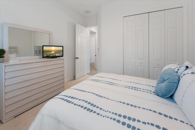 Golf, water, and sunrise views with true backyard privacy! Built on Lakewood National Golf Club in Florida - for sale on GolfHomes.com, golf home, golf lot