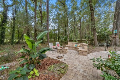 This stunning 4-bedroom, 3-bath Tom Hunt home is perfectly on Haile Plantation Golf and Country Club in Florida - for sale on GolfHomes.com, golf home, golf lot