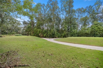 This stunning 4-bedroom, 3-bath Tom Hunt home is perfectly on Haile Plantation Golf and Country Club in Florida - for sale on GolfHomes.com, golf home, golf lot