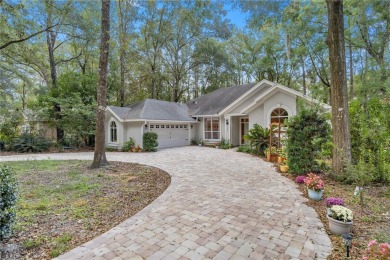 This stunning 4-bedroom, 3-bath Tom Hunt home is perfectly on Haile Plantation Golf and Country Club in Florida - for sale on GolfHomes.com, golf home, golf lot