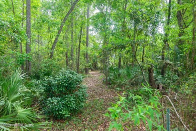Private, private, private, rare 3/4 acre lot with an additional on Julington Creek Golf Club in Florida - for sale on GolfHomes.com, golf home, golf lot