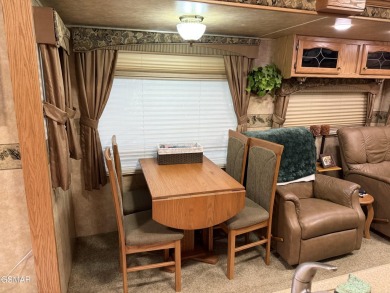 AMAZING...a beautiful corner RV lot with an immaculate 2007 on Bent Creek Golf Course in Tennessee - for sale on GolfHomes.com, golf home, golf lot