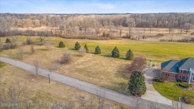 Build your dream home on this beautiful .48 acre lot located on on Country Club of Jackson in Michigan - for sale on GolfHomes.com, golf home, golf lot