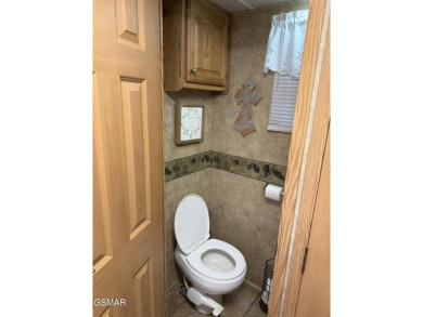 AMAZING...a beautiful corner RV lot with an immaculate 2007 on Bent Creek Golf Course in Tennessee - for sale on GolfHomes.com, golf home, golf lot