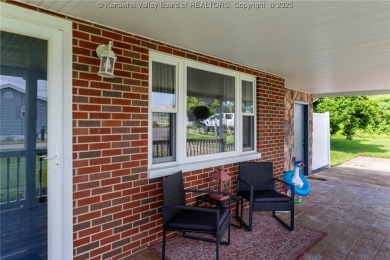 Charming one-level brick rancher, beautifully updated and on Riviera Country Club in West Virginia - for sale on GolfHomes.com, golf home, golf lot