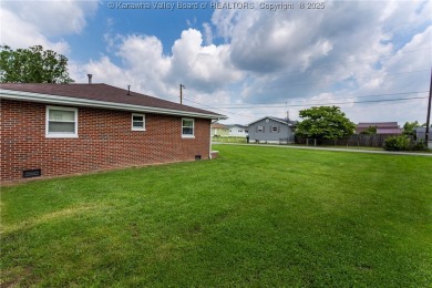 Charming one-level brick rancher, beautifully updated and on Riviera Country Club in West Virginia - for sale on GolfHomes.com, golf home, golf lot