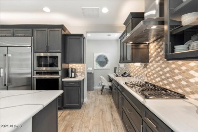 Stunning single level home located in Trilogy at Verde River on Vista Verde Golf Course in Arizona - for sale on GolfHomes.com, golf home, golf lot