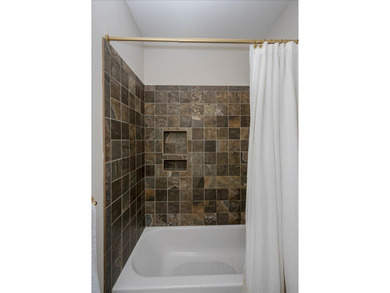 MITCHELL PARK - STUNNING CUSTOM BUILT HOME IN RIVERWOOD on Champions Retreat Golf Club in Georgia - for sale on GolfHomes.com, golf home, golf lot