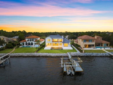 480 Captains Circle is an extraordinary waterfront estate within on Regatta Bay Golf and Country Club in Florida - for sale on GolfHomes.com, golf home, golf lot