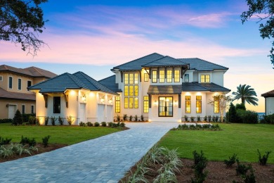 480 Captains Circle is an extraordinary waterfront estate within on Regatta Bay Golf and Country Club in Florida - for sale on GolfHomes.com, golf home, golf lot