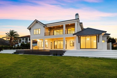 480 Captains Circle is an extraordinary waterfront estate within on Regatta Bay Golf and Country Club in Florida - for sale on GolfHomes.com, golf home, golf lot