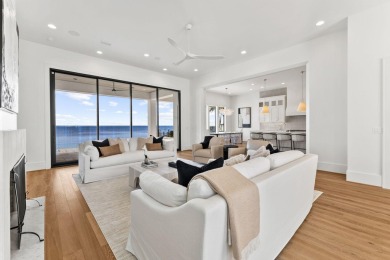 480 Captains Circle is an extraordinary waterfront estate within on Regatta Bay Golf and Country Club in Florida - for sale on GolfHomes.com, golf home, golf lot
