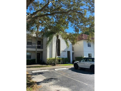 Beautiful corner unit on the 1st floor in beautiful Cypress at on Woodmont Country Club in Florida - for sale on GolfHomes.com, golf home, golf lot
