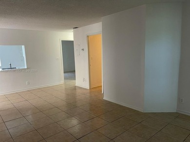 Beautiful corner unit on the 1st floor in beautiful Cypress at on Woodmont Country Club in Florida - for sale on GolfHomes.com, golf home, golf lot