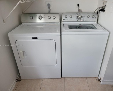 Beautiful corner unit on the 1st floor in beautiful Cypress at on Woodmont Country Club in Florida - for sale on GolfHomes.com, golf home, golf lot