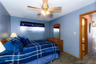 Experience lakefront living at its finest in this beautifully on Sycamore Creek Golf Club in Missouri - for sale on GolfHomes.com, golf home, golf lot