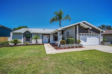 Located in the desirable Hunters Ridge community with low HOA on Timber Greens Country Club in Florida - for sale on GolfHomes.com, golf home, golf lot