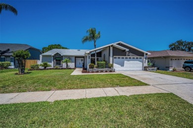 Located in the desirable Hunters Ridge community with low HOA on Timber Greens Country Club in Florida - for sale on GolfHomes.com, golf home, golf lot