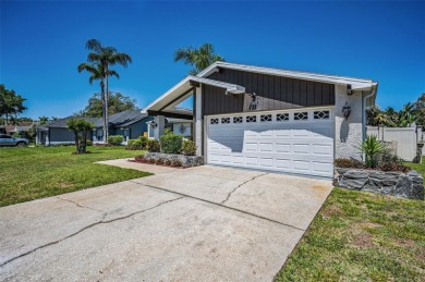Located in the desirable Hunters Ridge community with low HOA on Timber Greens Country Club in Florida - for sale on GolfHomes.com, golf home, golf lot