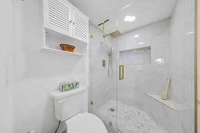 Assumable 5.1% VA Loan - Just $1,689/mo P&I!This fully renovated on The Country Club At Boca Raton in Florida - for sale on GolfHomes.com, golf home, golf lot