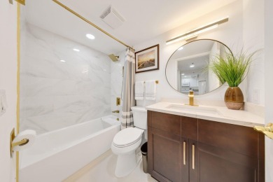 Assumable 5.1% VA Loan - Just $1,689/mo P&I!This fully renovated on The Country Club At Boca Raton in Florida - for sale on GolfHomes.com, golf home, golf lot