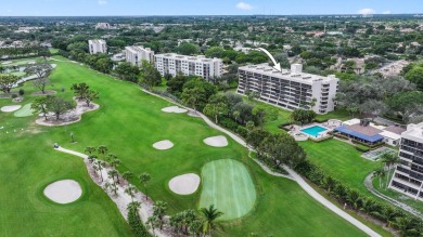 Assumable 5.1% VA Loan - Just $1,689/mo P&I!This fully renovated on The Country Club At Boca Raton in Florida - for sale on GolfHomes.com, golf home, golf lot