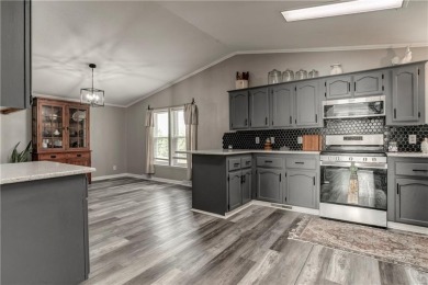 Come fall in love with this beautifully maintained five-lot on Linn Valley Lakes - Deer Trace Golf Course in Kansas - for sale on GolfHomes.com, golf home, golf lot