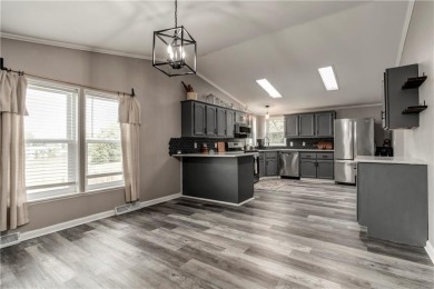 Come fall in love with this beautifully maintained five-lot on Linn Valley Lakes - Deer Trace Golf Course in Kansas - for sale on GolfHomes.com, golf home, golf lot