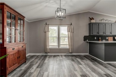 Come fall in love with this beautifully maintained five-lot on Linn Valley Lakes - Deer Trace Golf Course in Kansas - for sale on GolfHomes.com, golf home, golf lot