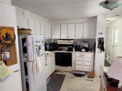 Welcome to 5086 Palena Drive in the gated 55+ community of on Sabal Trace Golf and Country Club in Florida - for sale on GolfHomes.com, golf home, golf lot