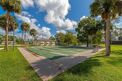 Welcome to 5086 Palena Drive in the gated 55+ community of on Sabal Trace Golf and Country Club in Florida - for sale on GolfHomes.com, golf home, golf lot