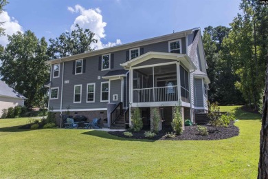 Welcome to 127 Lake Summit Drive, a meticulously built 4-bedroom on Timberlake Country Club in South Carolina - for sale on GolfHomes.com, golf home, golf lot