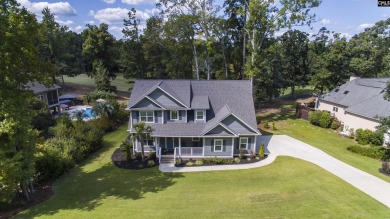 Welcome to 127 Lake Summit Drive, a meticulously built 4-bedroom on Timberlake Country Club in South Carolina - for sale on GolfHomes.com, golf home, golf lot